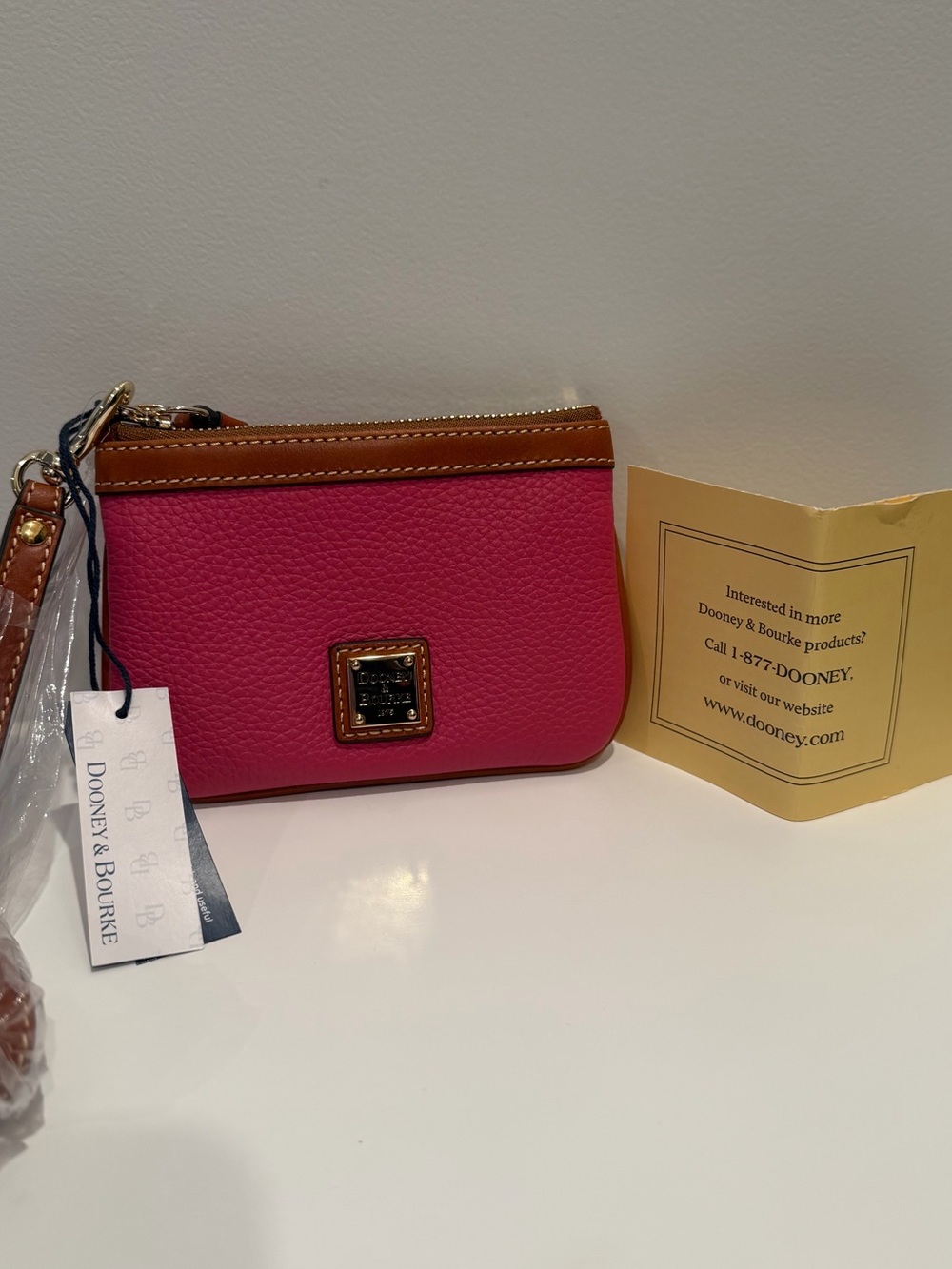 Dooney and Bourke Hot Pink Pebble Grain Leather Wristlet with Brown Trim, NWT